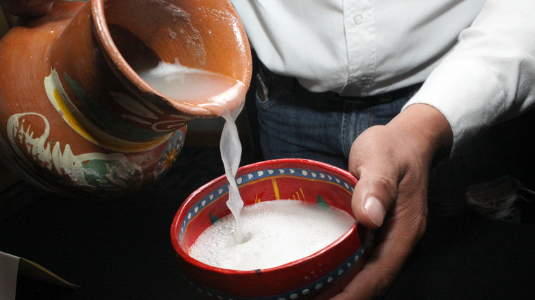Pulque being poured into a cup