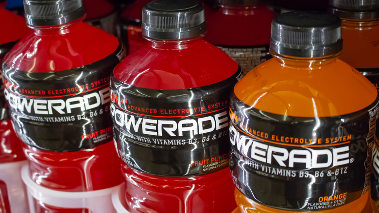 Bottles of Fruit Punch Powerade on a store shelf