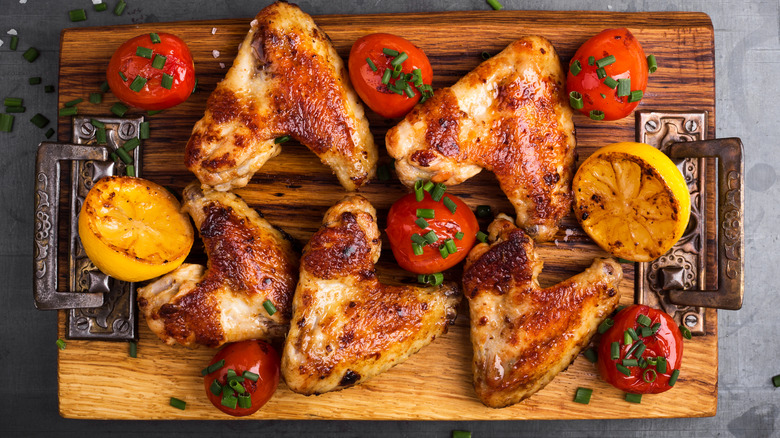 Grilled half chicken with lemon and rosemary.