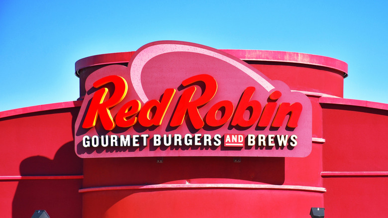 red robin storefront under blue sky