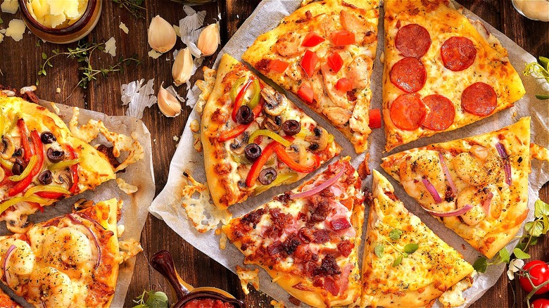 Pizza slices with different toppings 