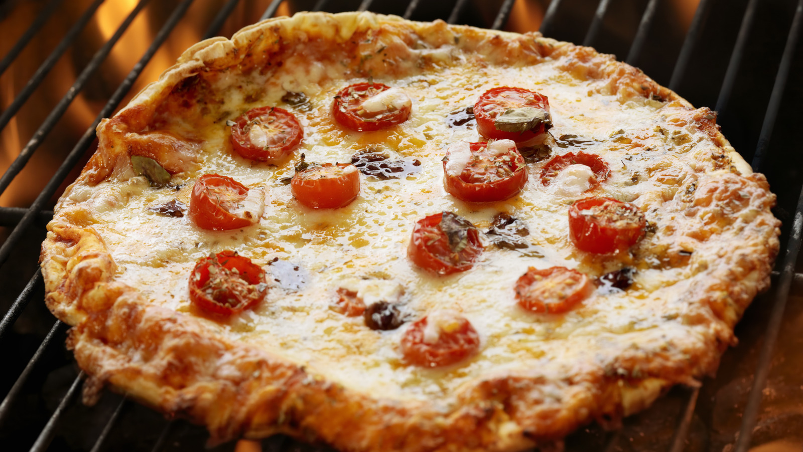 Reheat Your Pizza On The Grill For A Smoky Finish