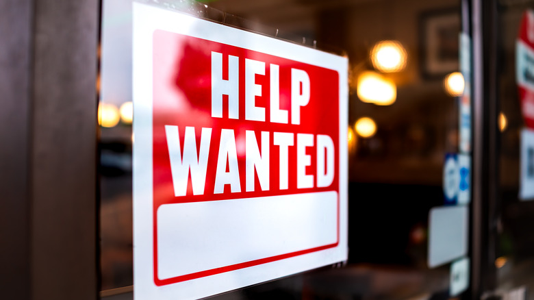 Red 'help wanted' sign