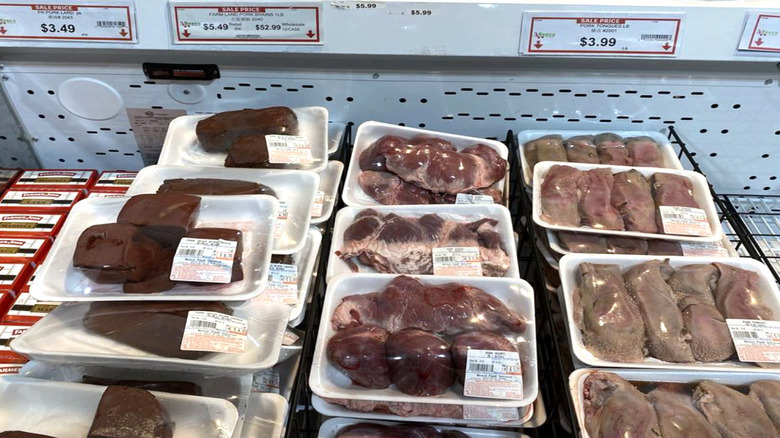 selection of pork offal packaged in grocery cooler