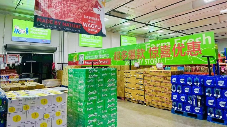Interior of resco warehouse sore with stacks of grocery items