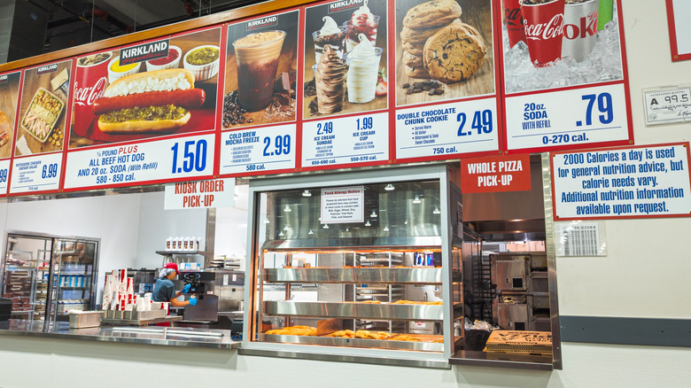 A Costco food court counter and menu