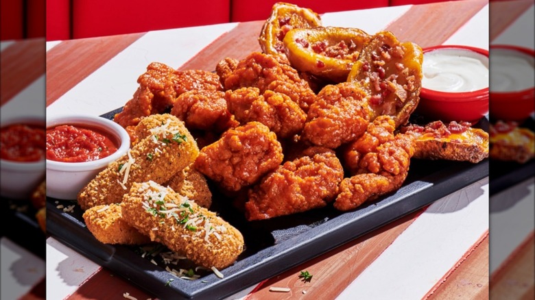 TGI Fridays Classic Combo on red-and-white-striped table.