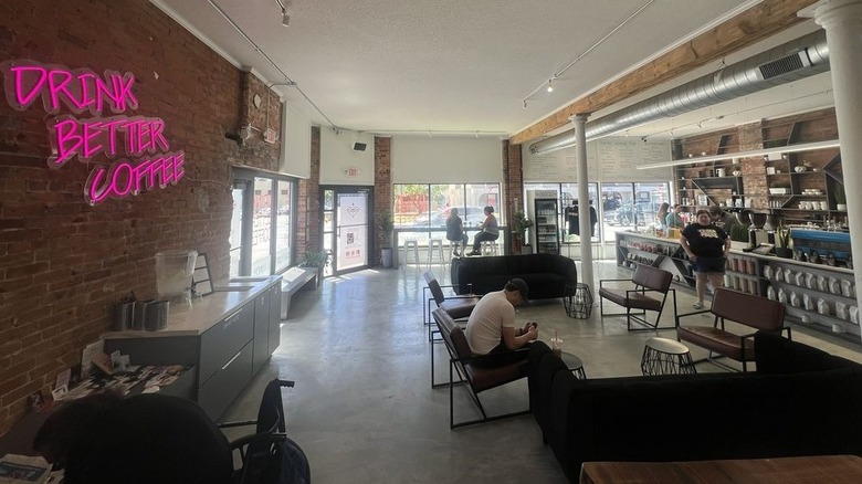 The interior of 392Caffe in Davenport, Iowa during the daytime with customers in attendance
