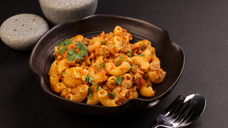 American goulash in a dark bowl