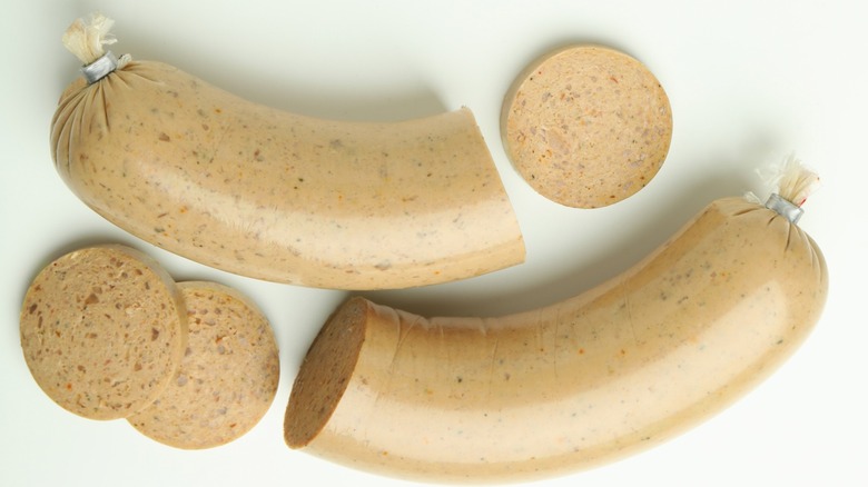 Liverwurst sausage on a white background