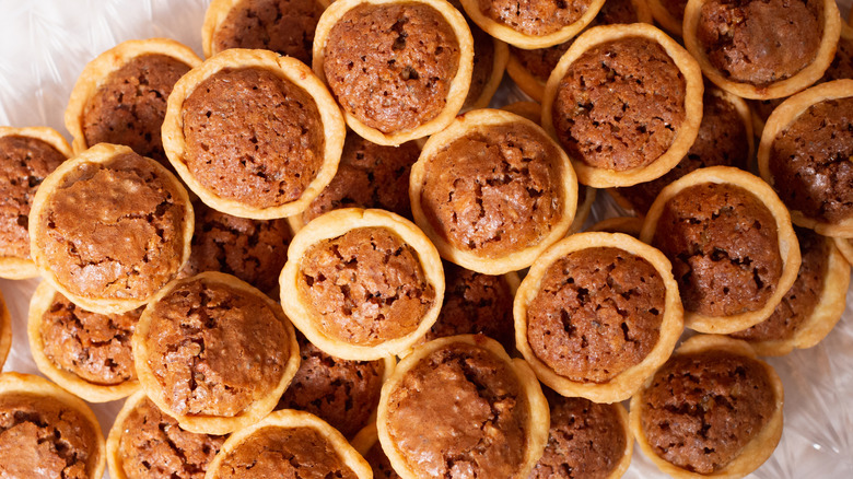 A stack of bite-sized pecan tassies
