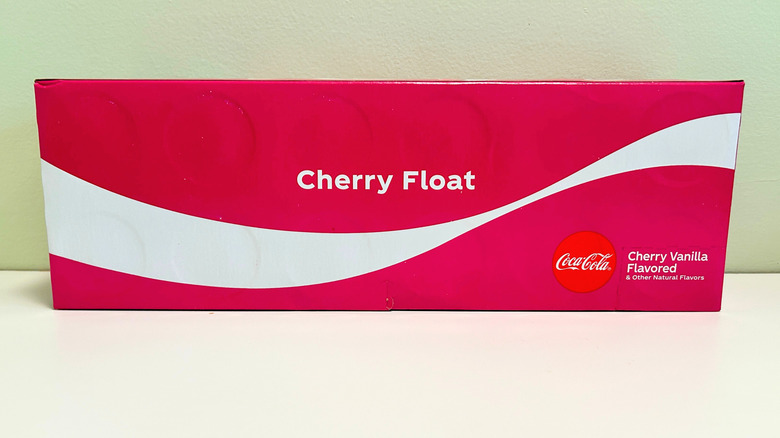 Close up of a 12 pack that says Cherry Float