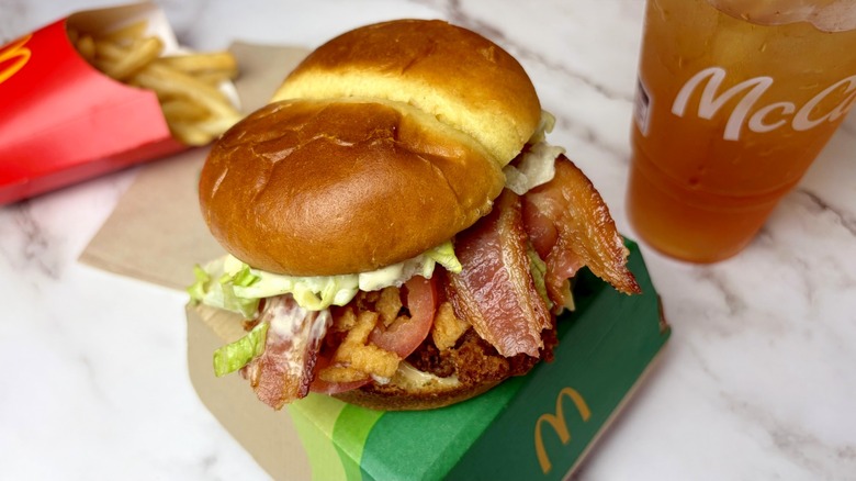 The limited time Bacon Caesar McCrispy Sandwich with McDonald's fries and a drink