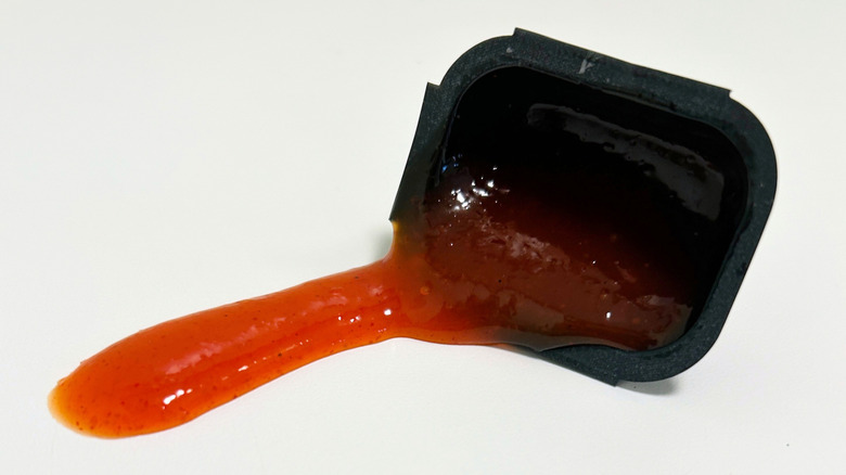 Close up of a McDonald's Hot Honey Sauce packet