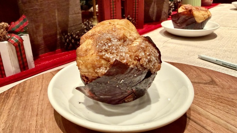 A Cinnamon Pull-Apart Bread from Starbucks on a plate on top of a wooden platter