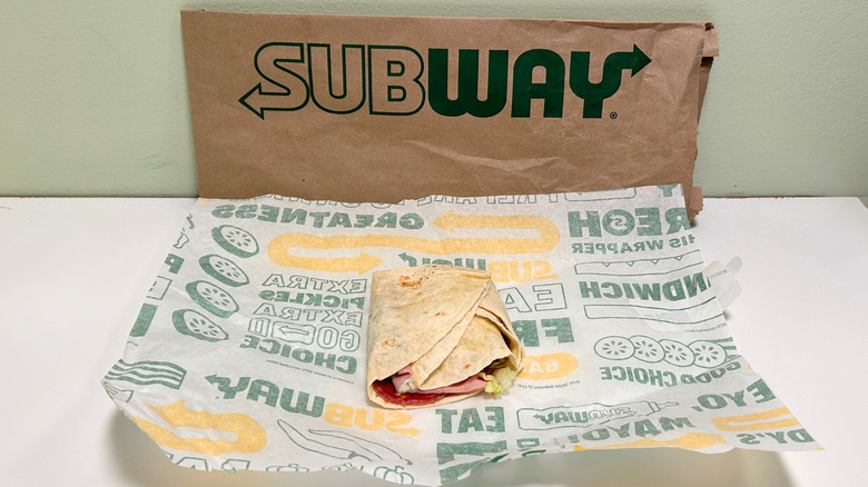 An Italian Trio Protein Pocket on a wrapper in front of a Subway bag