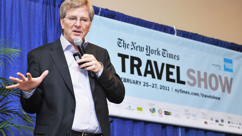 Rick Steves speaking at a travel forum