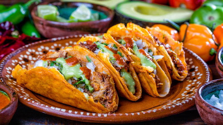 Barbacoa tacos on a plate