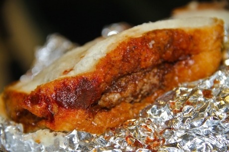 The pig burger comes wrapped in tinfoil whether you order it to-go or to stay.