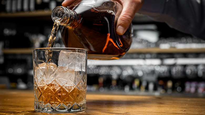 pouring whiskey