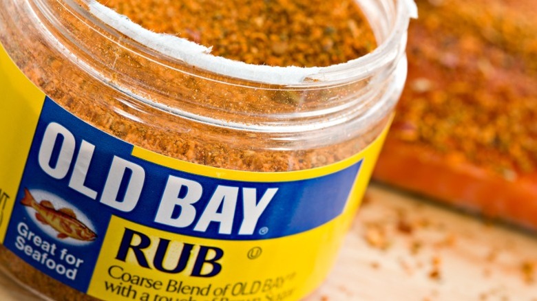 A glass jar of Old Bay rub