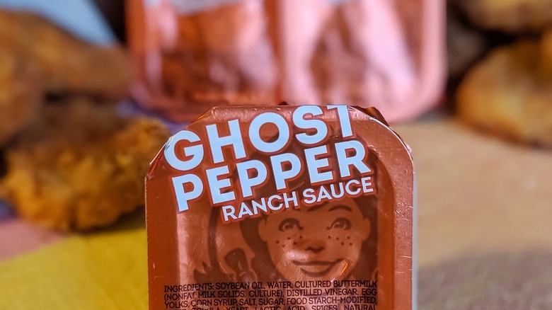 A packet of Wendy's ghost pepper ranch sauce.