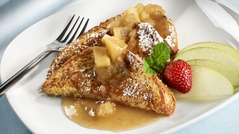 french toast slices on plate with fruit