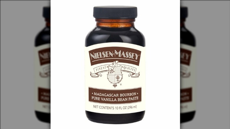 Nielson Massey vanilla bean paste on white background