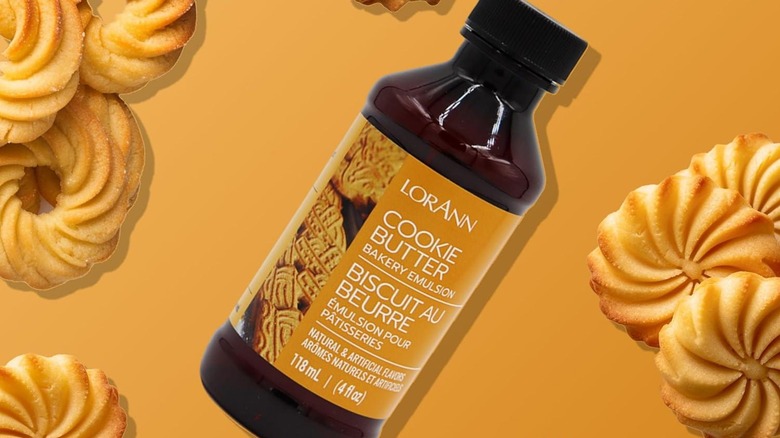 LorAnn cookie butter bakery emulsion against a camel-colored backdrop with cookies around it.