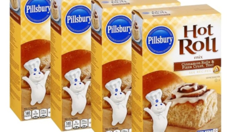 Packs of Pillsbury hot roll mix against a white background.
