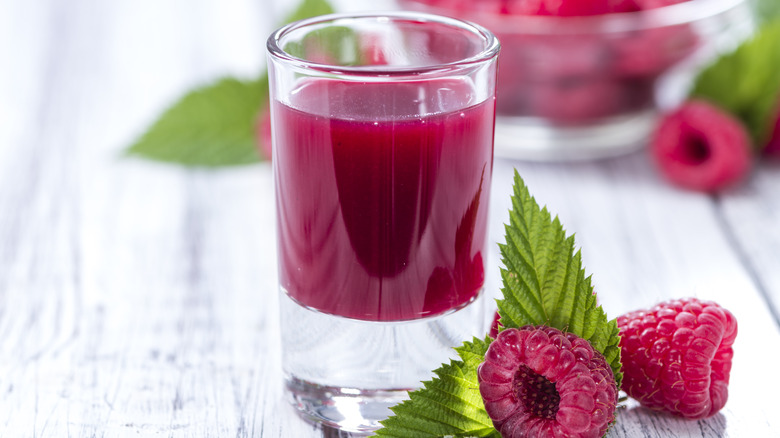 Raspberry liqueur in shot glass