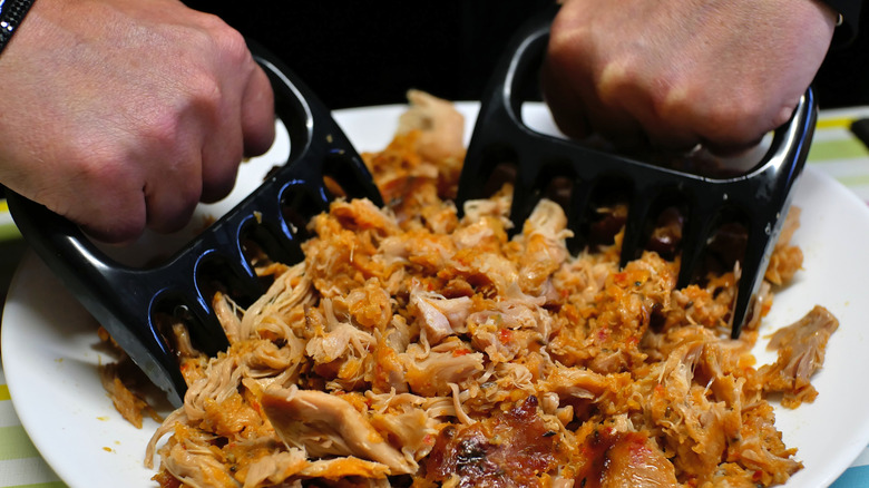 Meat claws shredding pork roast