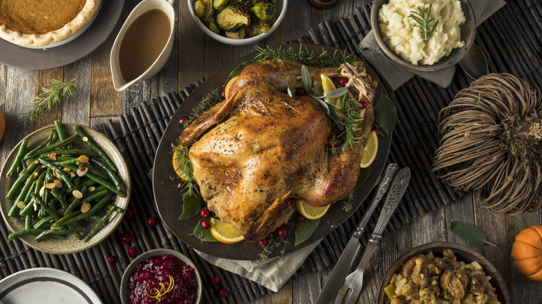 Thanksgiving turkey and sides on table
