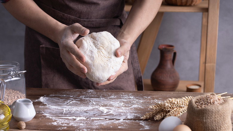 kneading bread dough ball