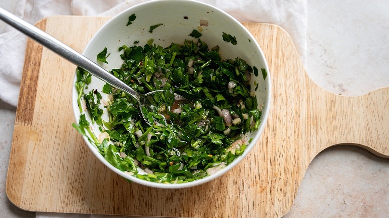 chimichurri ingredients in bowl 