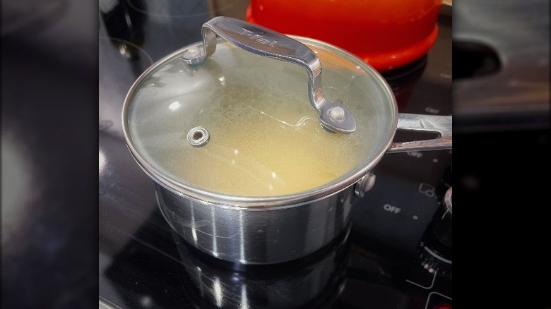 pot with glass lid on stove