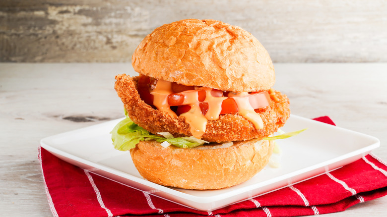 A fried pork chop sandwich.