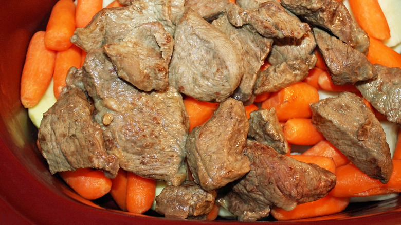 meat and vegetables in slow cooker
