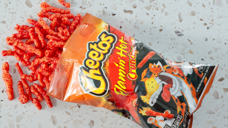 Bag of Flamin' Hot Cheetos with Cheetos falling out