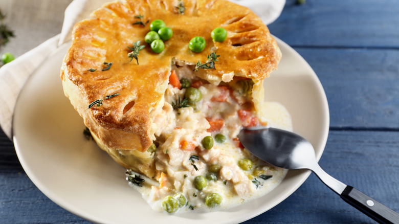 A small chicken pot pie on a plate