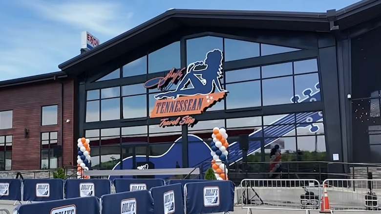 Exterior of Dolly's Tennessean Truck Stop with a large silhouette of Parton resting on the state of Tennessee