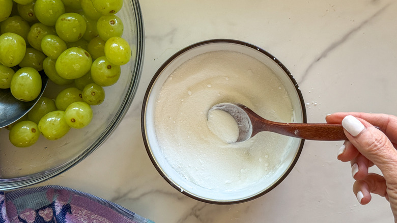 hand stirring sugar mixture