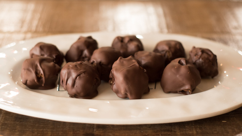 A white plate filled with Kentucky bourbon balls