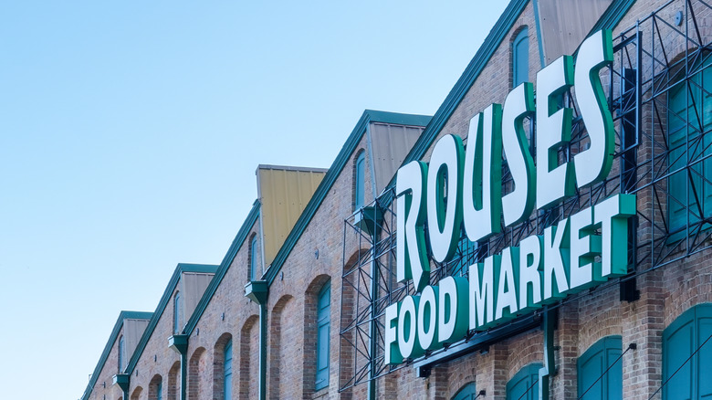 Close-up on an angled view of a Rouses Food Market storefront sign in New Orleans