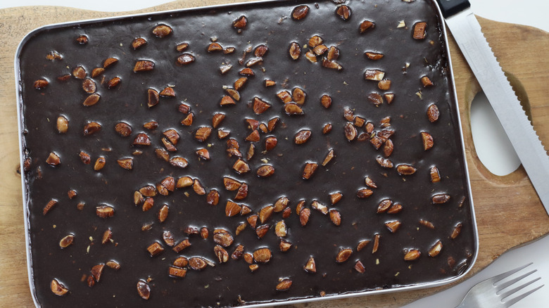 Texas sheet cake on a wooden board