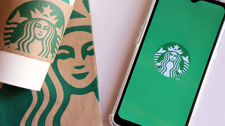 Starbucks app, cup, and bag