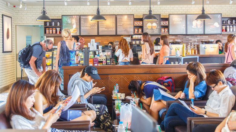 Customers sitting inside Starbucks