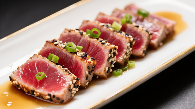Seared tuna, garnished with spring onions