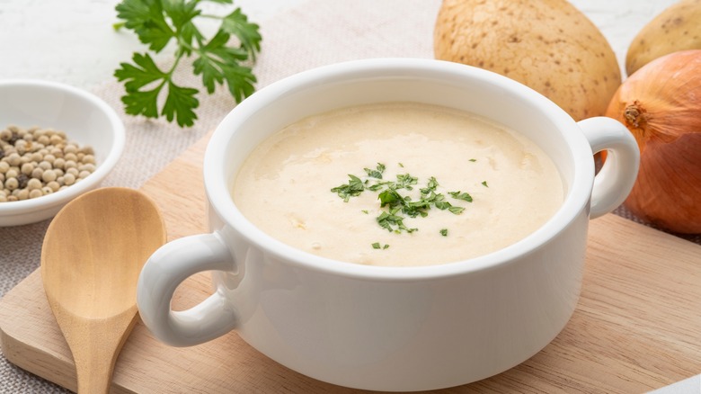 A bowl of creamy potato soup