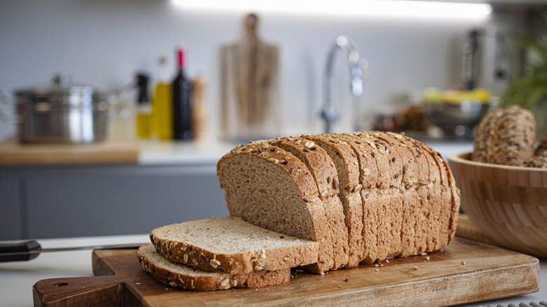 Loaf of bread on board on countertop